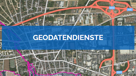Wort Geodatendienste über einem Luftbildausschnitt